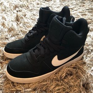 Nike black high tops women’s 8.5